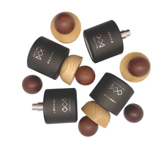 CCJ Parfum premium fragrance collection featuring ABDNCE and LOVERS perfumes in a styled flat lay, highlighting luxury and elegance. Catimbang